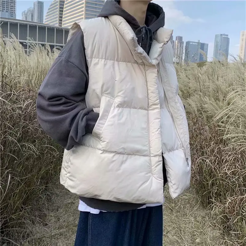 Fall and winter casual cotton-padded vests are worn over winter Korean fashion loose-fitting hooded vests and sleeveless vests
Fall and winter casual cotton-padded vests are worn over winter Korean fashion loose-fitting hooded vests and sleeveless vests