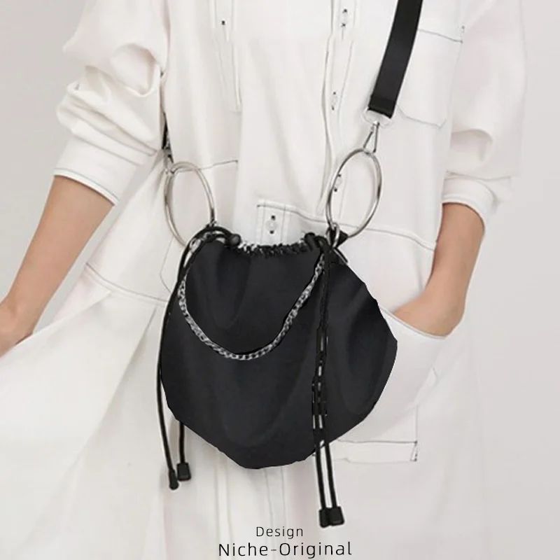 Niche Ladies Casual Versatile Small Bucket Bag Cool Black Metal Ring Decoration Long Shoulder Strap String Crossbody Bags
Niche Ladies Casual Versatile Small Bucket Bag Cool Black Metal Ring Decoration Long Shoulder Strap String Crossbody Bags