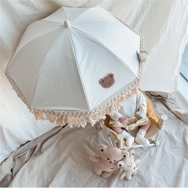 Cute Baby Stroller Umbrella Sunshade Lace Bohemian Children Outdoor Sun Shade Beach UV Protection Umbrella Kid Photography Props
Cute Baby Stroller Umbrella Sunshade Lace Bohemian Children Outdoor Sun Shade Beach UV Protection Umbrella Kid Photography Props