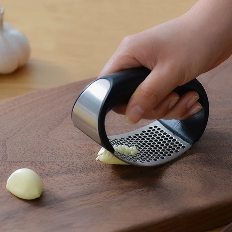 1pcs Stainless Steel Garlic Press Manual Mincer Chopping Tools Curve Fruit Vegetable Kitchen Gadgets
1pcs Stainless Steel Garlic Press Manual Mincer Chopping Tools Curve Fruit Vegetable Kitchen Gadgets