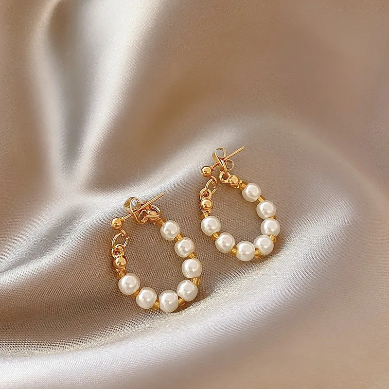 Pearl Tassel Earrings Design Sense High-end Earrings Retro Temperament Earrings
Pearl Tassel Earrings Design Sense High-end Earrings Retro Temperament Earrings