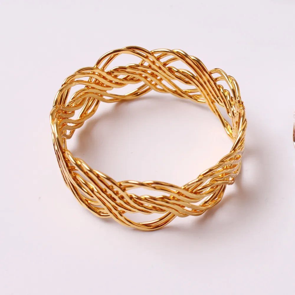 12PCS/Metal gold and silver woven napkin ring table decoration refers to the family holiday party hotel wedding banquet jewelry
12PCS/Metal gold and silver woven napkin ring table decoration refers to the family holiday party hotel wedding banquet jewelry