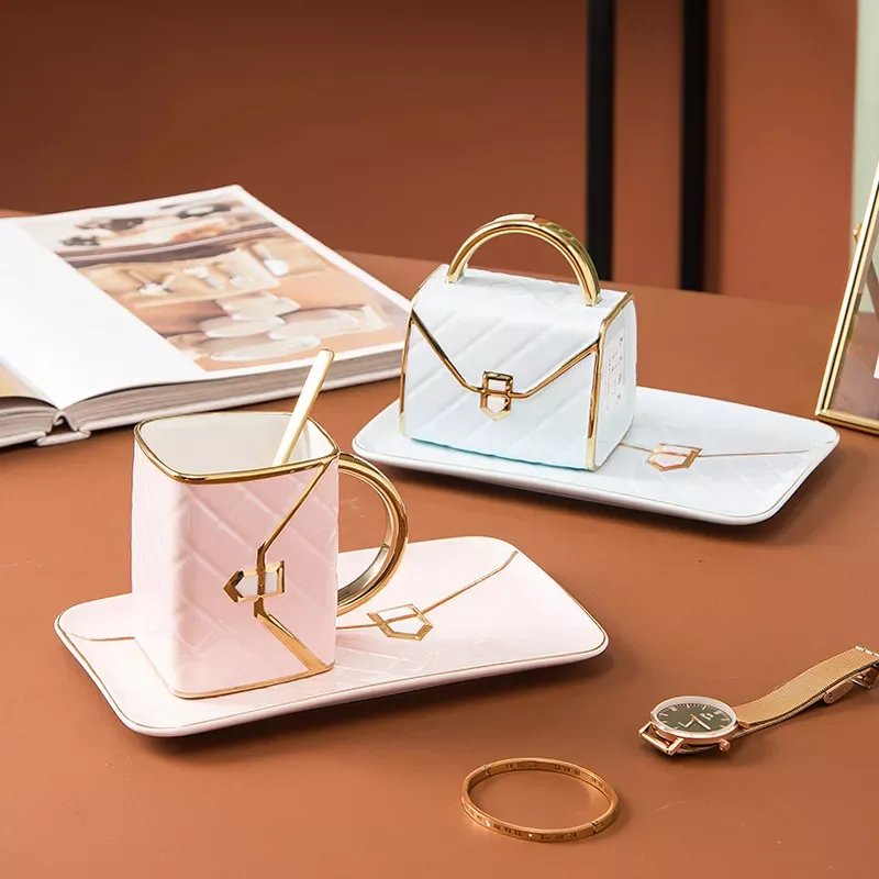 2022New Hand Bag Shaped Dessert Ceramic Plate Coffee Mug Cup Net Red Tracing Gold Coffee Cup and Plate Set Business Gift Mug
2022New Hand Bag Shaped Dessert Ceramic Plate Coffee Mug Cup Net Red Tracing Gold Coffee Cup and Plate Set Business Gift Mug