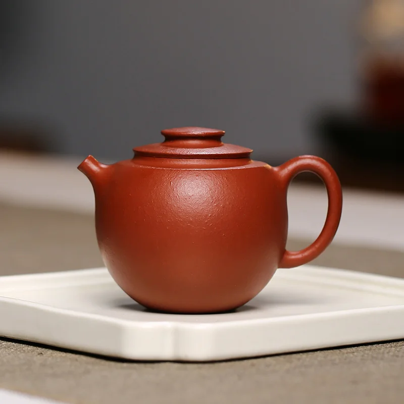Отличное качество, чайный круглая кастрюля из циннаберского песка Dahongpao, подлинный чайник из исинского фиолетового песка 160 куб. См
Отличное качество, чайный круглая кастрюля из циннаберского песка Dahongpao, подлинный чайник из исинского фиолетового песка 160 куб. См