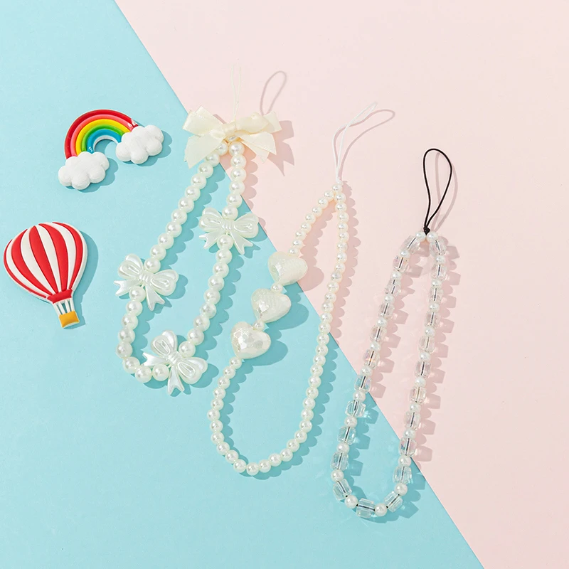 Imitation Pearl Crystal Bow Mobile Phone Chain Women Wrist Strap Cellphone Anti-lost Lanyard Telephone Pendant Jewelry Wholesale
Imitation Pearl Crystal Bow Mobile Phone Chain Women Wrist Strap Cellphone Anti-lost Lanyard Telephone Pendant Jewelry Wholesale