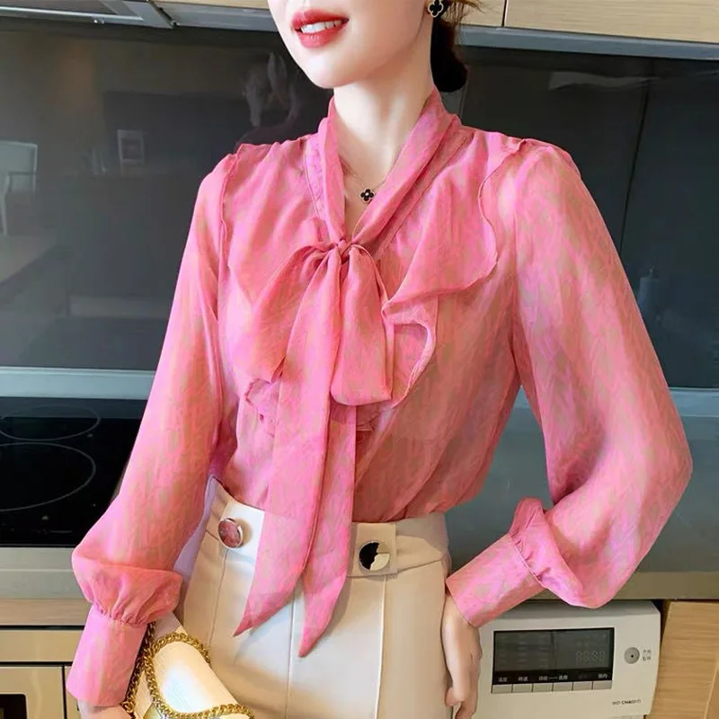 Elegant V-Neck Bow Printed Ruffles Lantern Sleeve Oversized Chiffon Shirt Loose Casual Pullovers Commute Female Clothing Blouse
Elegant V-Neck Bow Printed Ruffles Lantern Sleeve Oversized Chiffon Shirt Loose Casual Pullovers Commute Female Clothing Blouse