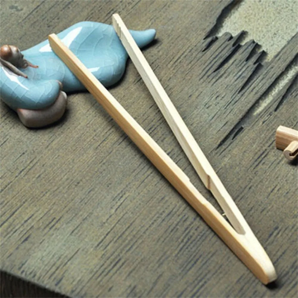 2pcs Wooden Tea Clip Bamboo Kitchen Salad Food Toast Tong Tweezer Bacon Sugar Ice Tea Utensil Teaware Accessories Wholesale
2pcs Wooden Tea Clip Bamboo Kitchen Salad Food Toast Tong Tweezer Bacon Sugar Ice Tea Utensil Teaware Accessories Wholesale