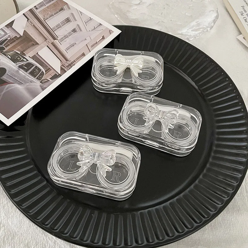 Cute Bow Knot Contact Lens L+R Cases Storage Holder Beautiful Transparent Laser Contact Lense Box Container Travel Accessaries
Cute Bow Knot Contact Lens L+R Cases Storage Holder Beautiful Transparent Laser Contact Lense Box Container Travel Accessaries