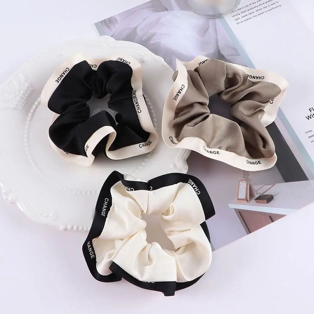 Cute French Simple Elegant Large Solid Color Rubber Band Letter Hair Rope Women Hair Rope Korean Style Scrunchies
Cute French Simple Elegant Large Solid Color Rubber Band Letter Hair Rope Women Hair Rope Korean Style Scrunchies