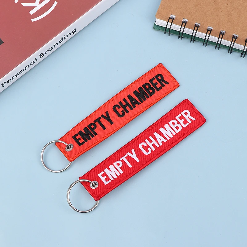 1pcs Red Empty Chamber Keychain For Aviation Gift Promotion Christmas Gifts Keychains Luggage Tag Embroidery Crew Key Chain
1pcs Red Empty Chamber Keychain For Aviation Gift Promotion Christmas Gifts Keychains Luggage Tag Embroidery Crew Key Chain