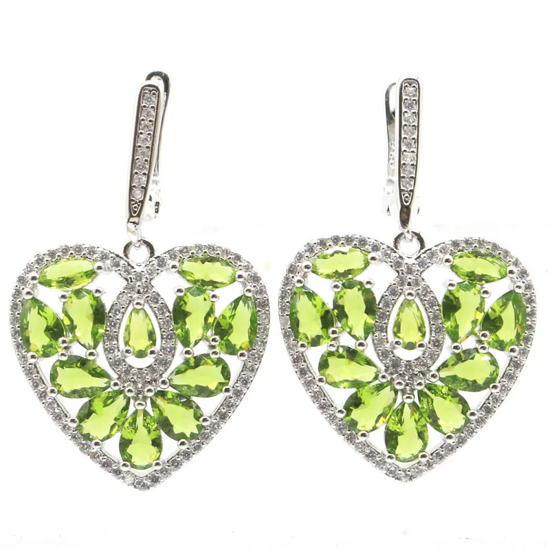38x24mm Lovely Heart Shape 7.3g Green Peridot White CZ Women Wedding 925 Silver Earrings
38x24mm Lovely Heart Shape 7.3g Green Peridot White CZ Women Wedding 925 Silver Earrings