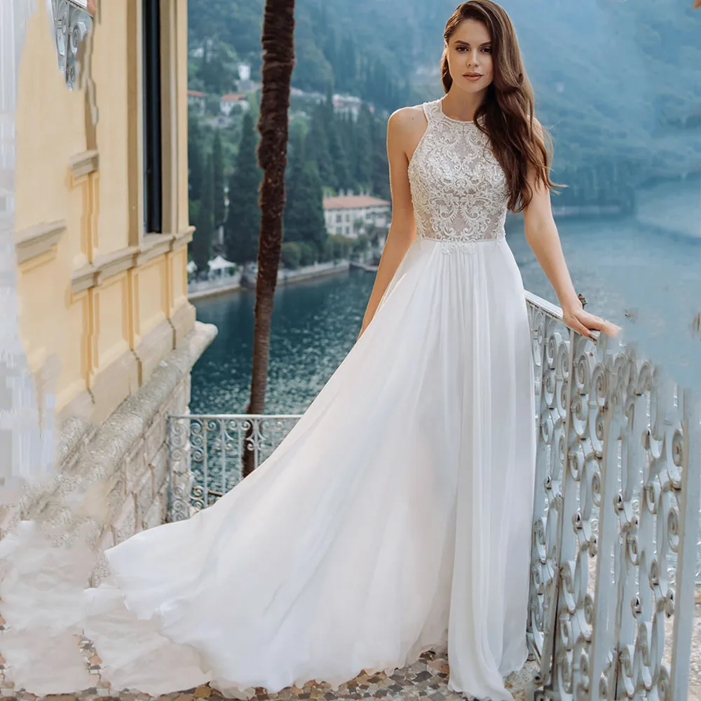 Sexy Lace Halter Wedding Dresses Backless A-Line 2022 Beach Appliques Bride Gown Sleeveless Sweep Train Fashion Robe De Mariee
Sexy Lace Halter Wedding Dresses Backless A-Line 2022 Beach Appliques Bride Gown Sleeveless Sweep Train Fashion Robe De Mariee