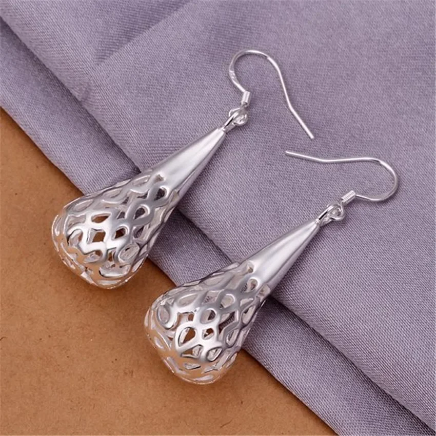E337 New Wholesale Price Women Lady Girl Silver Color Cute Hollow Drop Pretty Earrings High Quality Fashion Jewelry
E337 New Wholesale Price Women Lady Girl Silver Color Cute Hollow Drop Pretty Earrings High Quality Fashion Jewelry