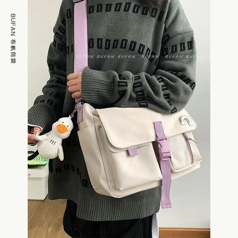 Japanese Nylon Canvas Bag Leisure Student Messenger Bag Girls' Cute Messenger Bag Student School Bag Tooling Package
Japanese Nylon Canvas Bag Leisure Student Messenger Bag Girls' Cute Messenger Bag Student School Bag Tooling Package