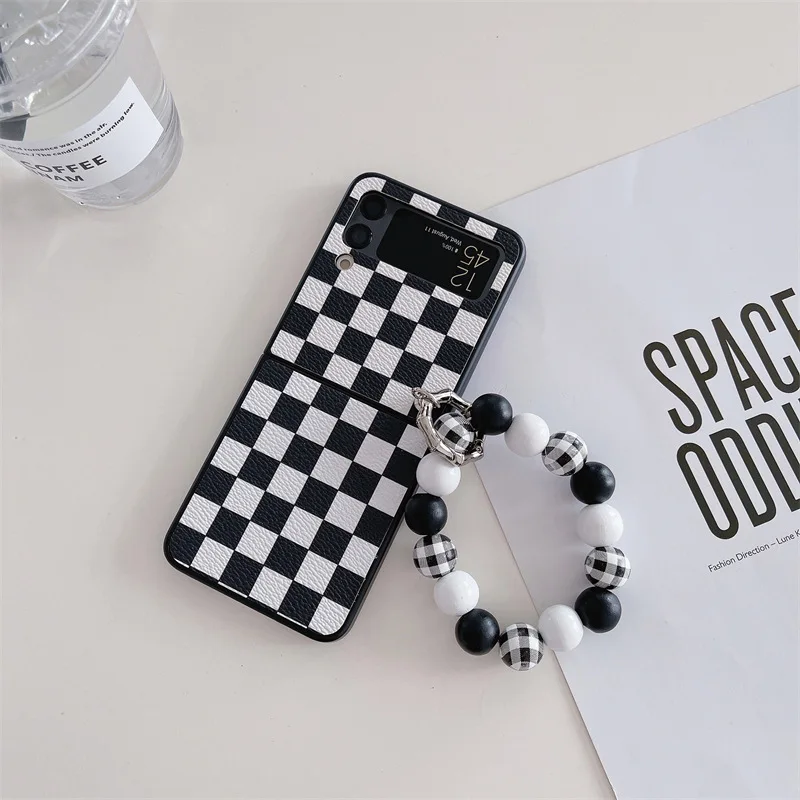 Checkerboard Beaded Hand String Phone Case for Samsung Galaxy Z Flip 3 Z Flip 4 Hard PC Back Cover for ZFlip3 ZFlip4 Case Shell
Checkerboard Beaded Hand String Phone Case for Samsung Galaxy Z Flip 3 Z Flip 4 Hard PC Back Cover for ZFlip3 ZFlip4 Case Shell