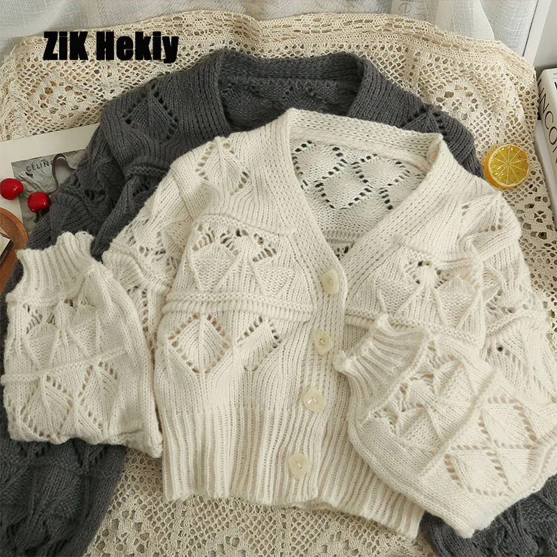 Zik Hekiy Sweater Women Autumn Short Section V-Neck Single-Breasted Long-Sleeved Knitwear Fashionable Hollow Cardigan Top
Zik Hekiy Sweater Women Autumn Short Section V-Neck Single-Breasted Long-Sleeved Knitwear Fashionable Hollow Cardigan Top