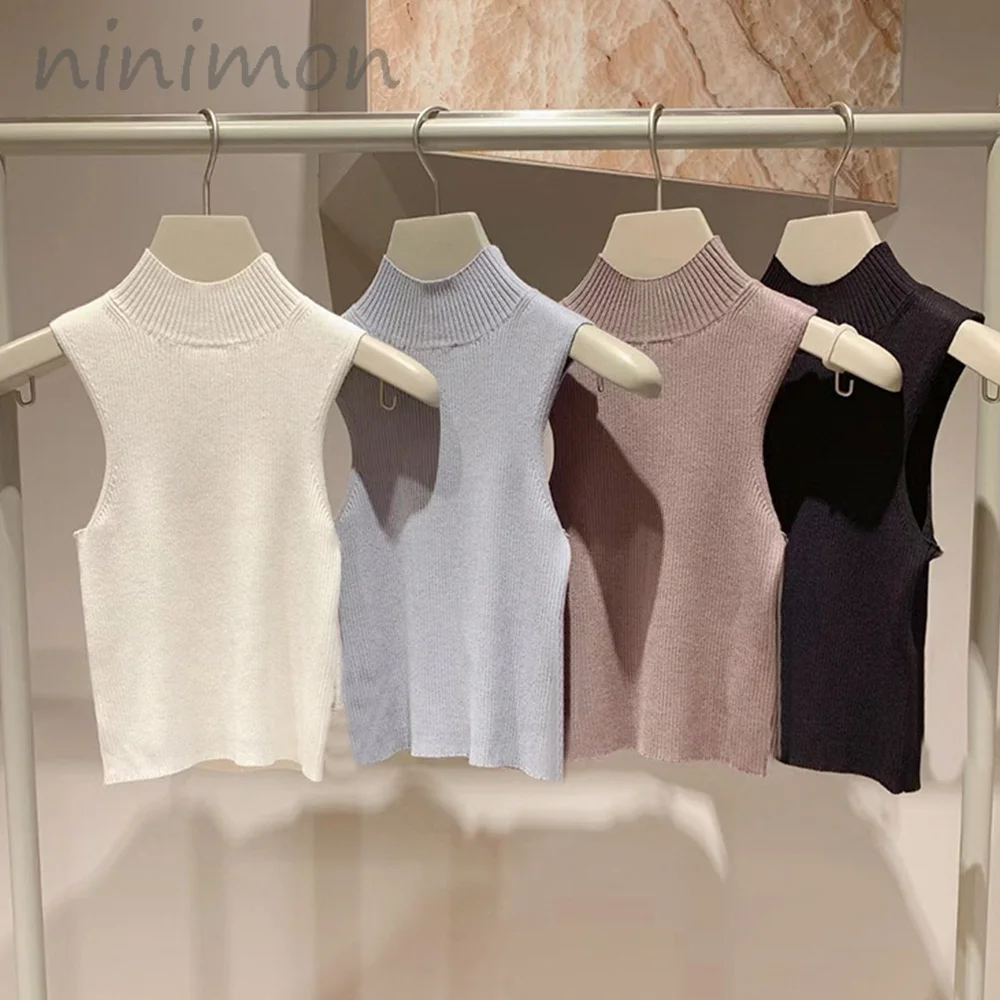 Трикотажная футболка-водолазка без рукавов, однотонная 
Трикотажная футболка-водолазка без рукавов, однотонная