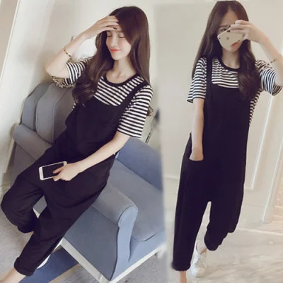 Short sleeved suit suspender pants women's summer Capri Pants Korean loose striped t suspender pants two-piece set
Short sleeved suit suspender pants women's summer Capri Pants Korean loose striped t suspender pants two-piece set