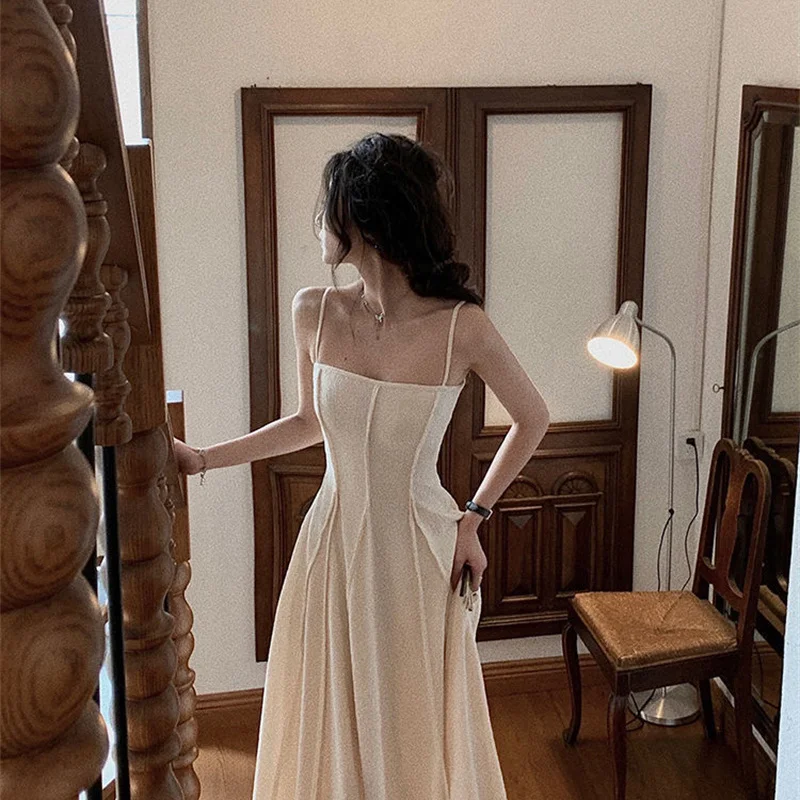 French Hepburn Style Spaghetti Strap Dress Women Summer Sleeveless Backless Folds Maxi Dresses Vestidos Elegantes Para Mujer
French Hepburn Style Spaghetti Strap Dress Women Summer Sleeveless Backless Folds Maxi Dresses Vestidos Elegantes Para Mujer