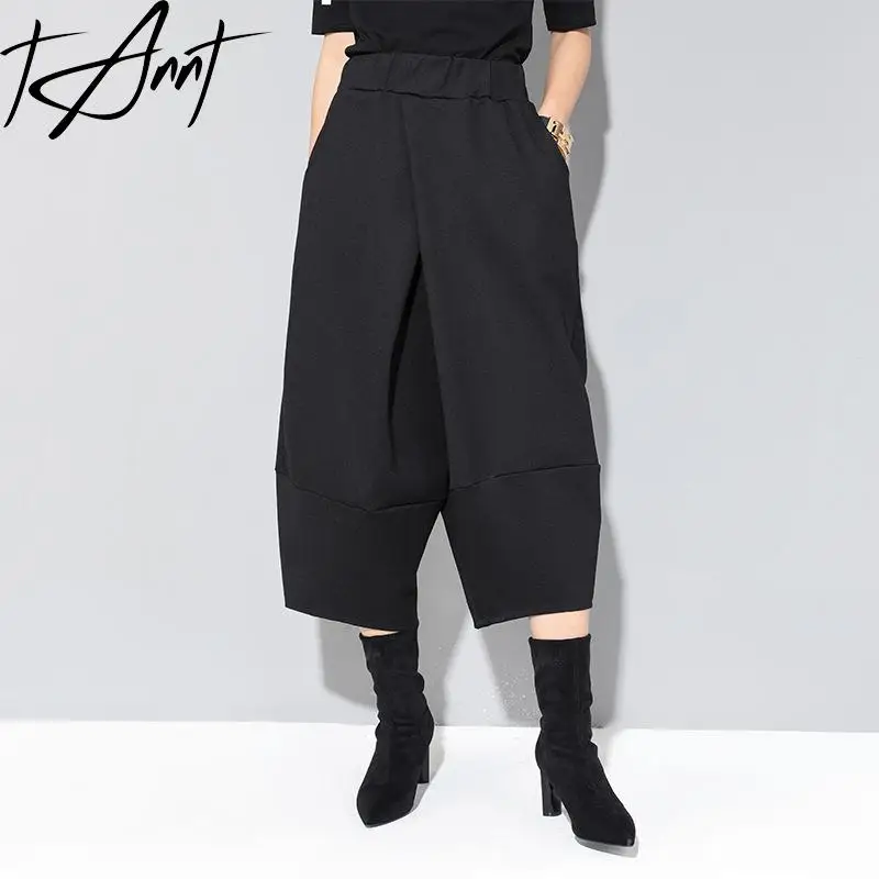 Брюки женские черные Асимметричные с широкими штанинами и высокой талией
Брюки женские черные Асимметричные с широкими штанинами и высокой талией