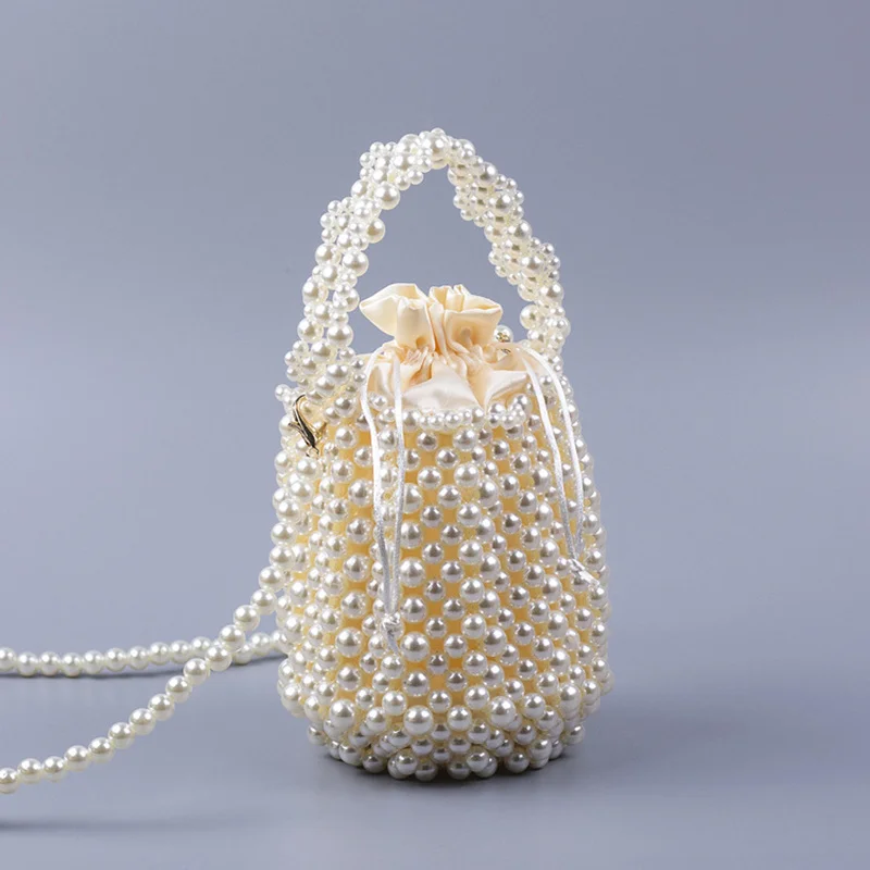Luxury Pearl Bucket Women Handbag 2022 New Hand Woven Lady Pearl Party Women Bag Shoulder Bag
Luxury Pearl Bucket Women Handbag 2022 New Hand Woven Lady Pearl Party Women Bag Shoulder Bag