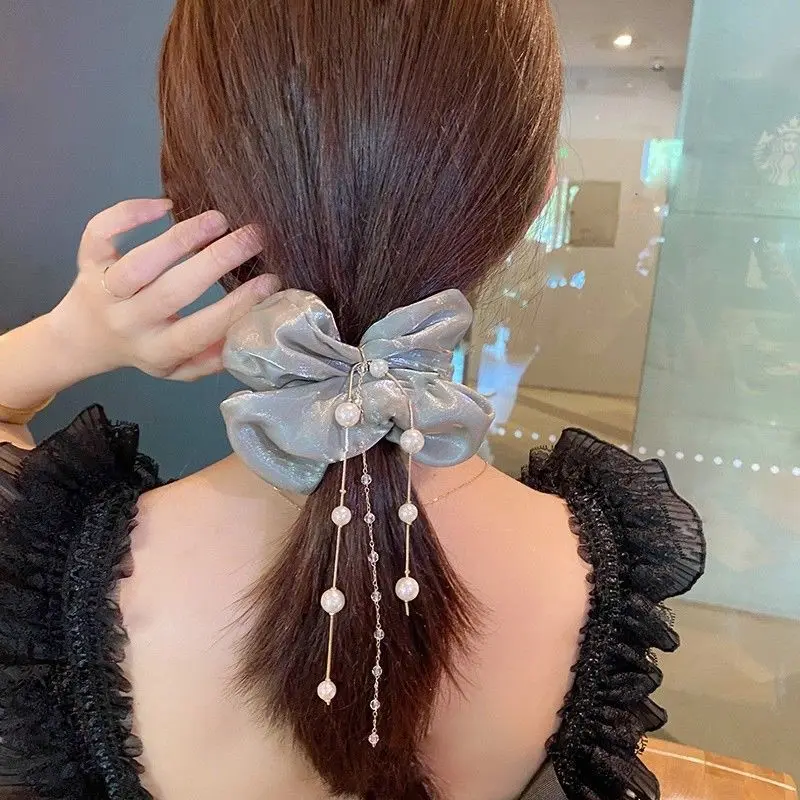 Women's Hair Rope South Korea Elegant Pearls Tassel Chiffon Large Intestine Elastic Hair Ring Bowknot Ponytail Hair Accessories
Women's Hair Rope South Korea Elegant Pearls Tassel Chiffon Large Intestine Elastic Hair Ring Bowknot Ponytail Hair Accessories