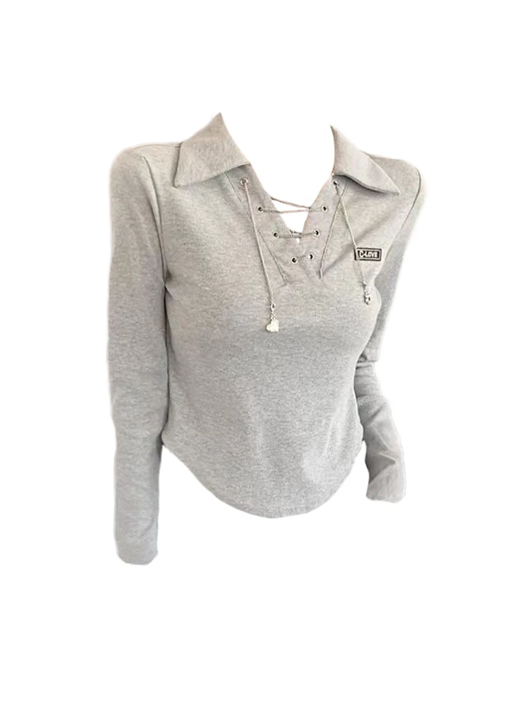 Футболка женская с цепочкой, модный пикантный слайм в Корейском стиле, на шнуровке, с воротником с отворотом Gyaru, Y2K, уличная одежда на осень
Футболка женская с цепочкой, модный пикантный слайм в Корейском стиле, на шнуровке, с воротником с отворотом Gyaru, Y2K, уличная одежда на осень