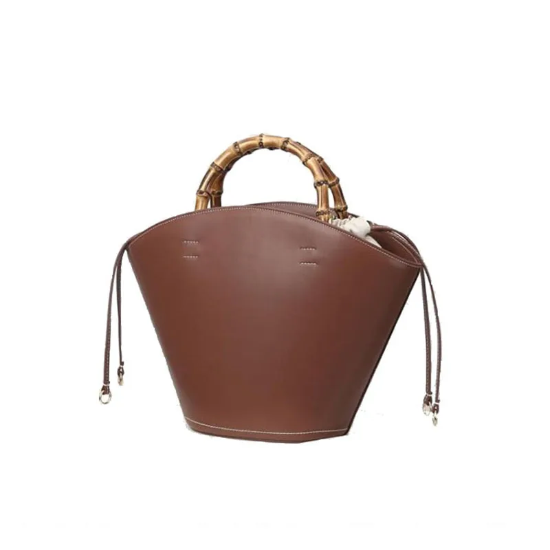 Luxury leather Women's Bag Retro Bamboo Tote Large Capacity Tote Bucket Bag Fashion Foreign Style Single Shoulder Crossbody Bag
Luxury leather Women's Bag Retro Bamboo Tote Large Capacity Tote Bucket Bag Fashion Foreign Style Single Shoulder Crossbody Bag