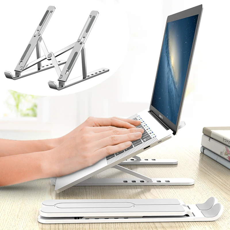 Portable Laptop Stand Foldable Support Base Notebook Stand For Macbook Pro Lapdesk PC Computer Laptop Holder Cooling Pad Riser
Portable Laptop Stand Foldable Support Base Notebook Stand For Macbook Pro Lapdesk PC Computer Laptop Holder Cooling Pad Riser