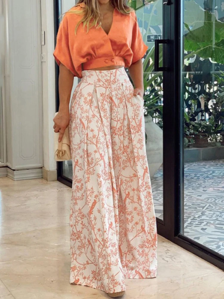Women's Two Piece One Shoulder Top Print Pants Loose Suit Sexy Short Wide Leg Pants Conjunto De Dos Piezas De Moda Para Mujer
Women's Two Piece One Shoulder Top Print Pants Loose Suit Sexy Short Wide Leg Pants Conjunto De Dos Piezas De Moda Para Mujer