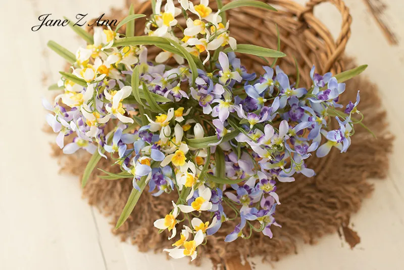 Simulation of dendrobium bouquet orchid small flowers newborn baby photo decoration photography props about 50cm
Simulation of dendrobium bouquet orchid small flowers newborn baby photo decoration photography props about 50cm