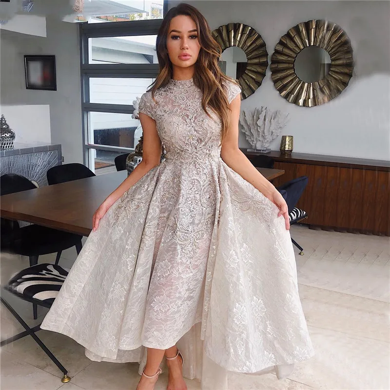High Neck LuxuryCelebrity Prom Dresses Cap Sleeve Lace Beading Asymmetrical Party Evening robe soirée femme vestidos de gala
High Neck LuxuryCelebrity Prom Dresses Cap Sleeve Lace Beading Asymmetrical Party Evening robe soirée femme vestidos de gala
