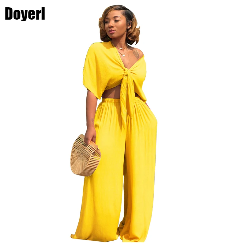 2 Piece Set Women 2022 Summer Set Short Sleeve Bow Tie Up Crop Top and Long Wide Leg Pants Set Fashion Ladies Trousers Suits 
2 Piece Set Women 2022 Summer Set Short Sleeve Bow Tie Up Crop Top and Long Wide Leg Pants Set Fashion Ladies Trousers Suits