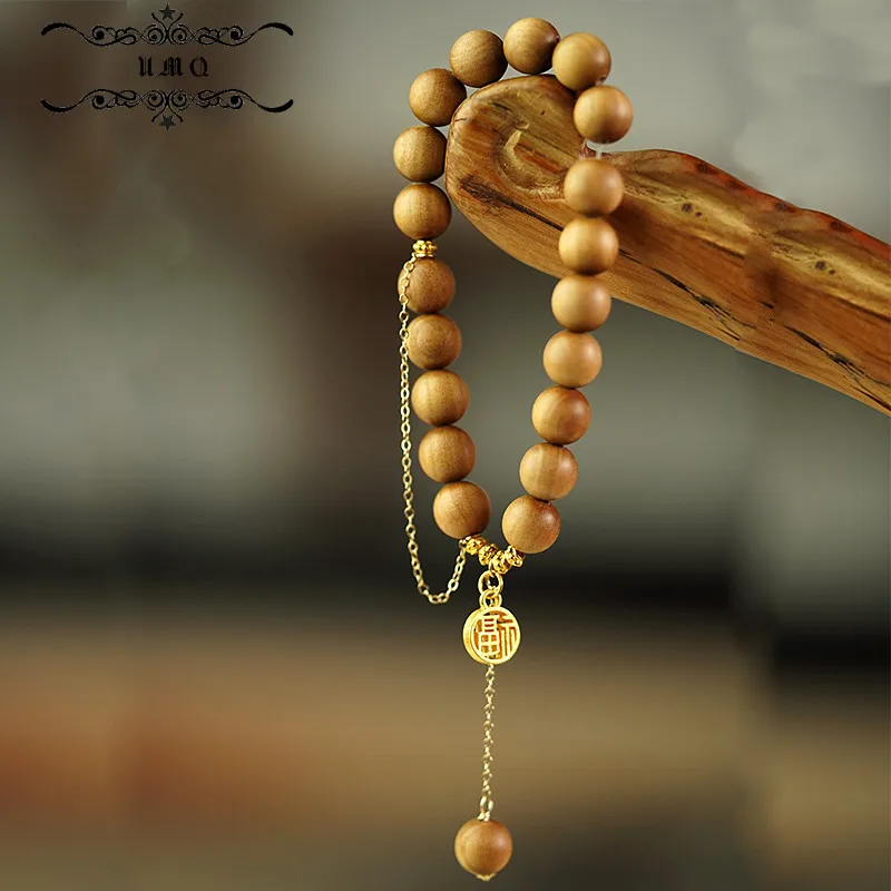 Indian Old Sandalwood Bracelet 6 / 8mm Single Ring Old Material Sandalwood Single Ring 14k Gold Wrapped Blessing Word Pendant
Indian Old Sandalwood Bracelet 6 / 8mm Single Ring Old Material Sandalwood Single Ring 14k Gold Wrapped Blessing Word Pendant
