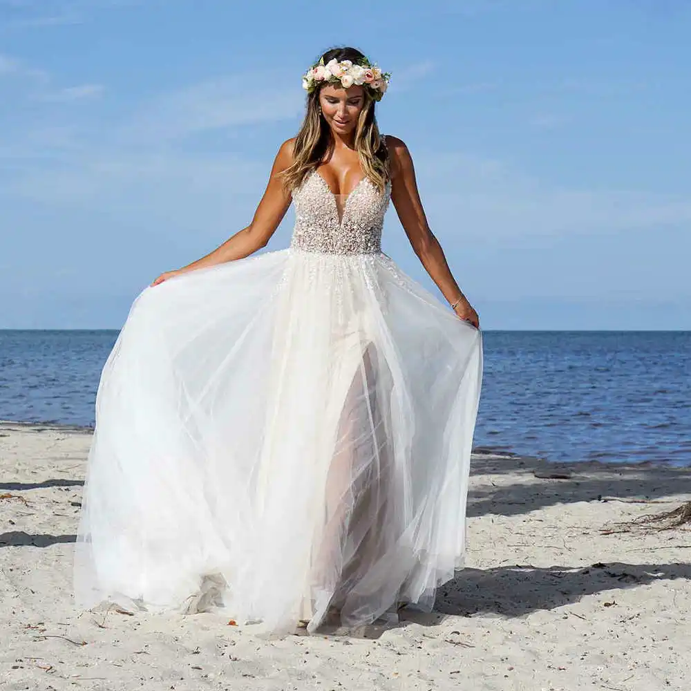Luxury Ladies Sexy Beaded Wedding Dresses Vestido De Novia Slit Premium Illusion Tulle Beach V-Neck Bridal Gowns Robe De Mariée
Luxury Ladies Sexy Beaded Wedding Dresses Vestido De Novia Slit Premium Illusion Tulle Beach V-Neck Bridal Gowns Robe De Mariée