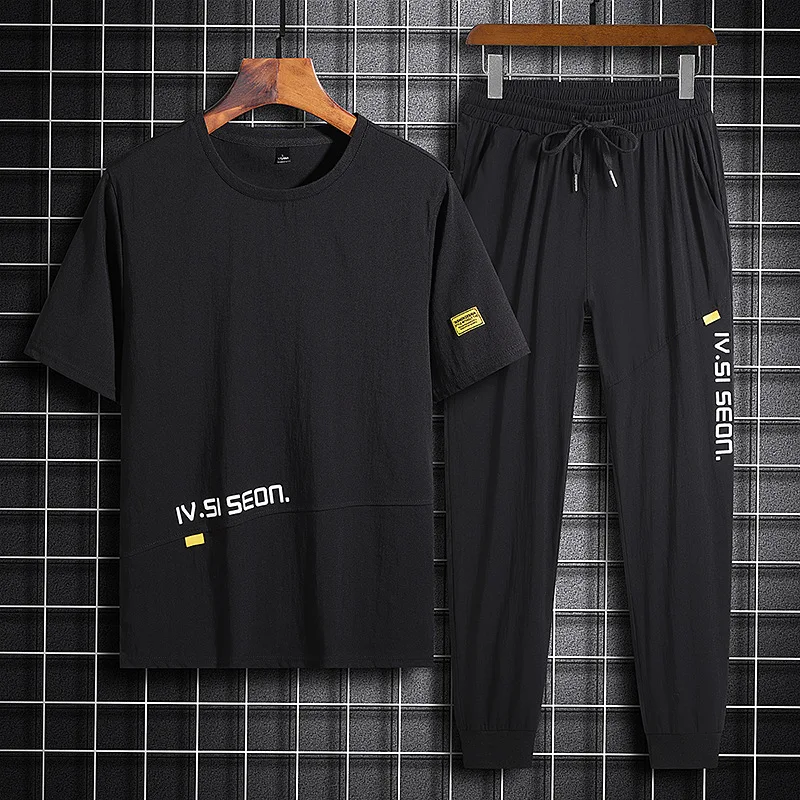 Men's casual ice silk suit men's sportswear spring and summer trend with handsome short sleeved five point sleeved sport
Men's casual ice silk suit men's sportswear spring and summer trend with handsome short sleeved five point sleeved sport