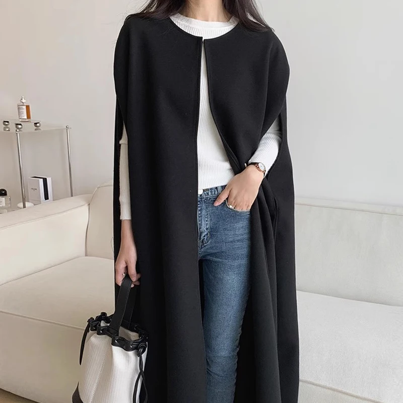 Clothland Women Retro Open Stitch Woolen Jacket Cape Style Loose Long Waistcoat White Black Thick Winter Vest Coat CA870
Clothland Women Retro Open Stitch Woolen Jacket Cape Style Loose Long Waistcoat White Black Thick Winter Vest Coat CA870