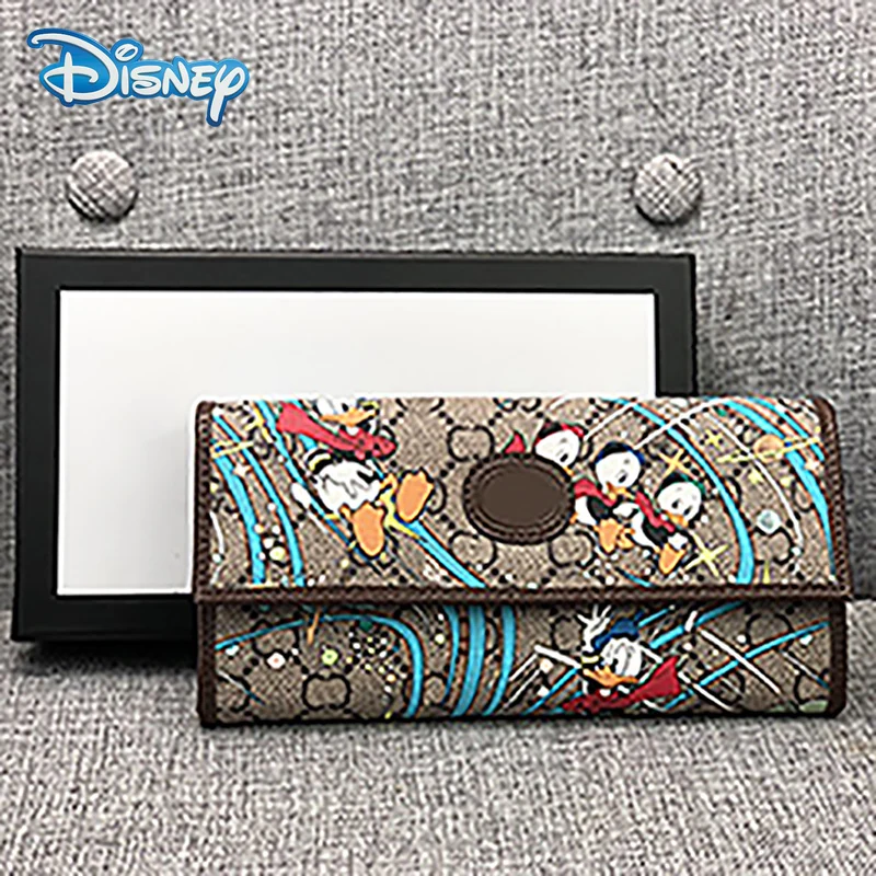 New Disney Cartoon Donald Duck Woman Long Wallet Casual Fashion Men Short Card Holder High Quality Clutch Multi-card Coin Purse
New Disney Cartoon Donald Duck Woman Long Wallet Casual Fashion Men Short Card Holder High Quality Clutch Multi-card Coin Purse