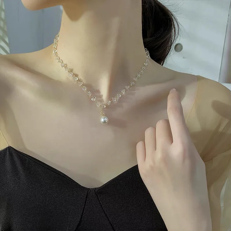 U-Magical Fashion Irregular Clear Crystal Simulation Pearl Chokers Necklace for Women Beaded Designed Pendant Necklace Jewellery
U-Magical Fashion Irregular Clear Crystal Simulation Pearl Chokers Necklace for Women Beaded Designed Pendant Necklace Jewellery