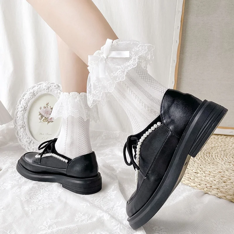 Socks women solid color retro sweet lace jk sen series black and white cute college style lolita fashion sock
Socks women solid color retro sweet lace jk sen series black and white cute college style lolita fashion sock
