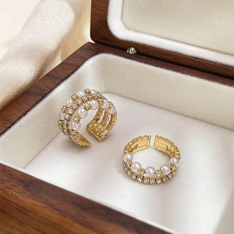Minar Classic Multi Layered 18K Gold Plated Simulated Pearls CZ Zircon Open Ring for Women Stainless Steel Rings Daily Jewelry
Minar Classic Multi Layered 18K Gold Plated Simulated Pearls CZ Zircon Open Ring for Women Stainless Steel Rings Daily Jewelry