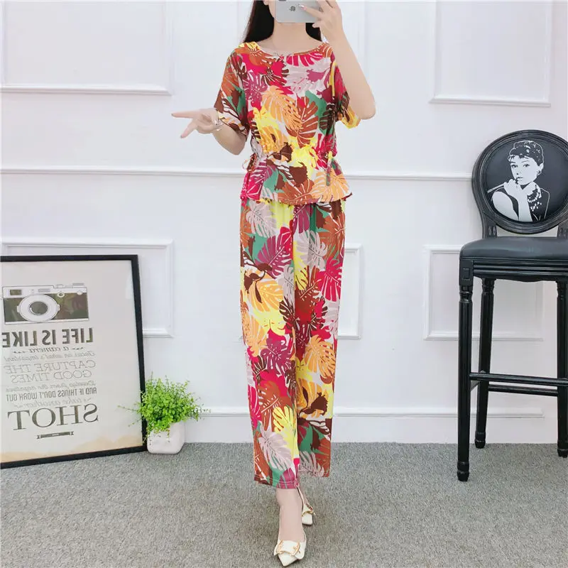 Women 2022 Summer Retro Printing Suit Female Wide Leg Pants New Loose Short Sleeve Fashion Tops Casual Two Piece Set 4XL M17
Women 2022 Summer Retro Printing Suit Female Wide Leg Pants New Loose Short Sleeve Fashion Tops Casual Two Piece Set 4XL M17