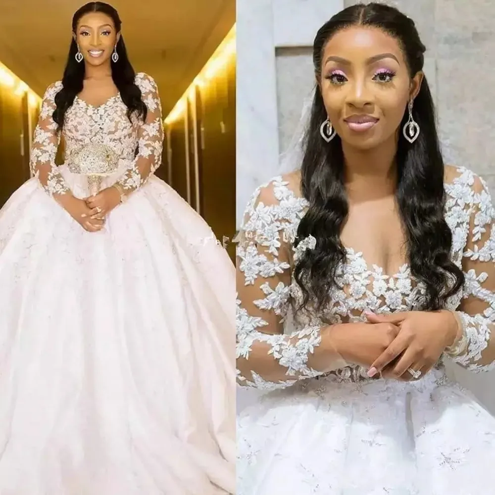 Lace African Ball Gowns Wedding Dresses Long Sleeve Illusion Princess Bridal Gowns Elegant Court Train 2022 vestido de novia
Lace African Ball Gowns Wedding Dresses Long Sleeve Illusion Princess Bridal Gowns Elegant Court Train 2022 vestido de novia