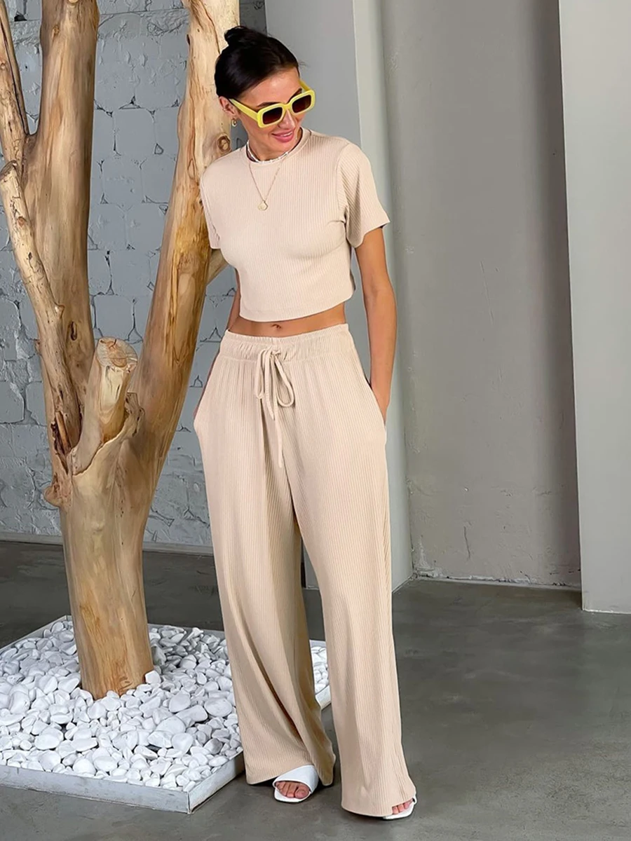Ribbed Knitted Pant Suits Slim Short Sleeve Slim T-shirt With Drawstring Wide Leg Pants Outfits Women Fashion Solid 2 Piece Sets
Ribbed Knitted Pant Suits Slim Short Sleeve Slim T-shirt With Drawstring Wide Leg Pants Outfits Women Fashion Solid 2 Piece Sets