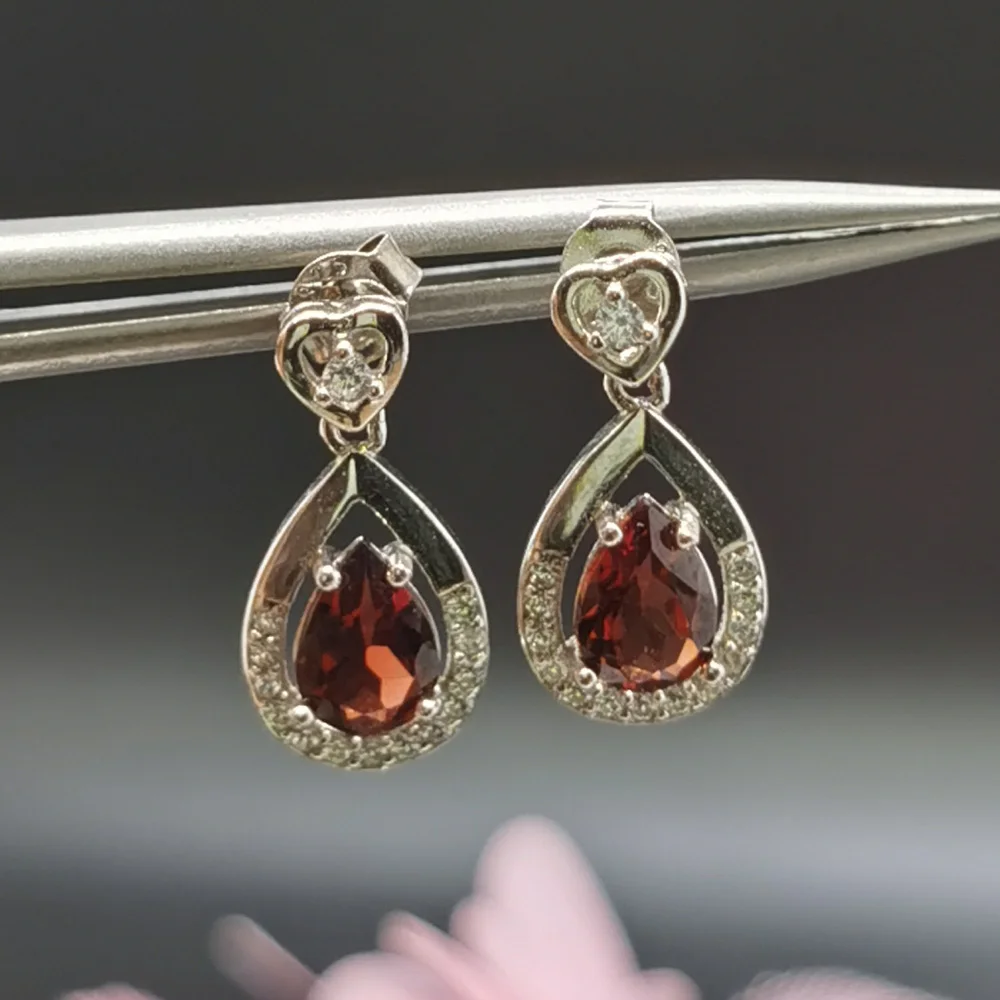 Total 1ct Natural Garnet Stud Earrings for Daily Wear 5mm*7mm VVS Grade Garnet 925 Silver Earrings Gift for Woman
Total 1ct Natural Garnet Stud Earrings for Daily Wear 5mm*7mm VVS Grade Garnet 925 Silver Earrings Gift for Woman