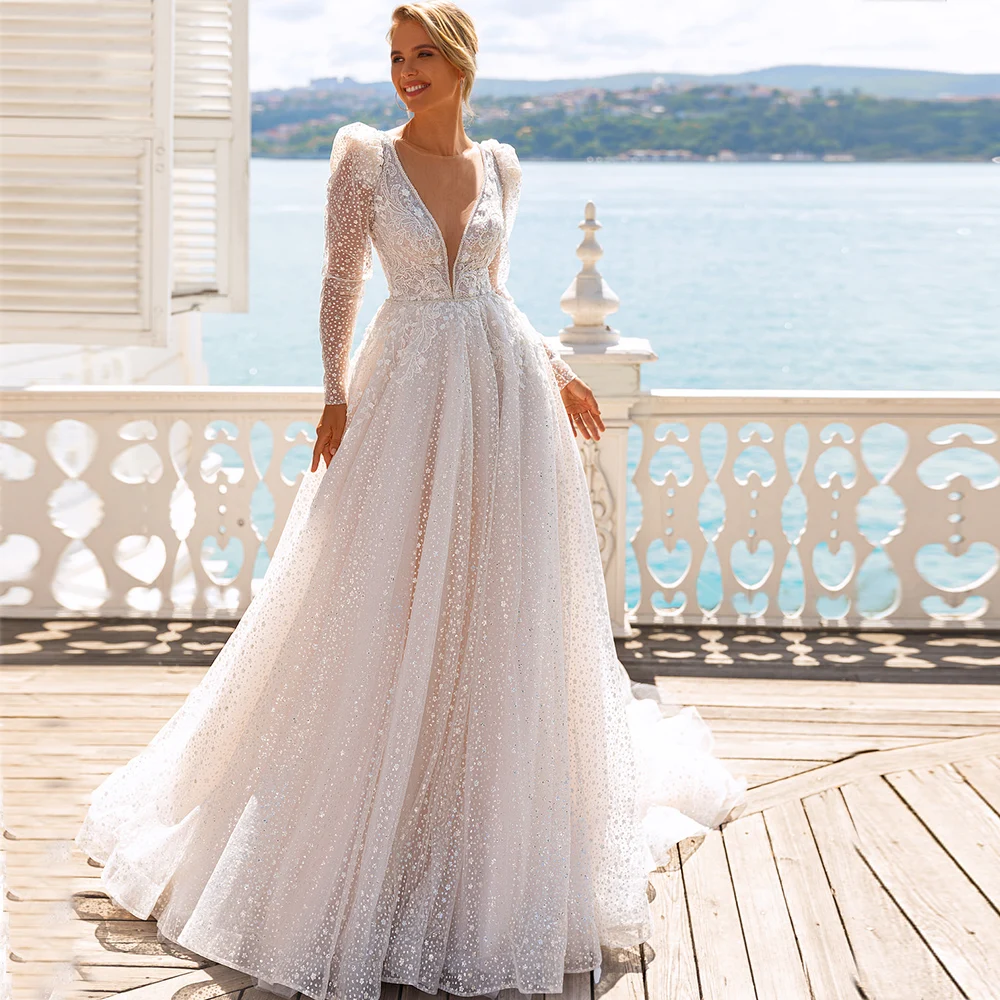 Luxury Exquisite Wedding Dresses V-Neck Long Sleeves Tulle Dress A-Line Sequined Appliques Lace Beaded Sweep Train Bridal Gowns
Luxury Exquisite Wedding Dresses V-Neck Long Sleeves Tulle Dress A-Line Sequined Appliques Lace Beaded Sweep Train Bridal Gowns
