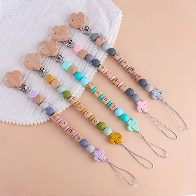 Personalized Name DIY Baby Pacifier Clips Cactus Wooden Teethers Dummy Nipple Holder Clip Chain Teething Toy Newborn Accessories
Personalized Name DIY Baby Pacifier Clips Cactus Wooden Teethers Dummy Nipple Holder Clip Chain Teething Toy Newborn Accessories