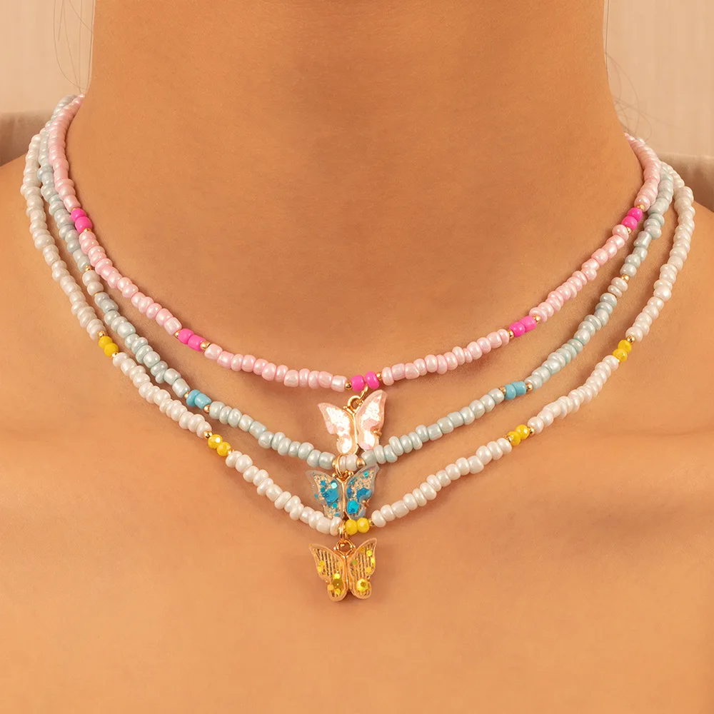 

DONATTO Cute Butterfly Pendant Necklace Women Boho Seed Beads Strand Choker Korean Statement Charm Jewelry Vacation Beach Gift