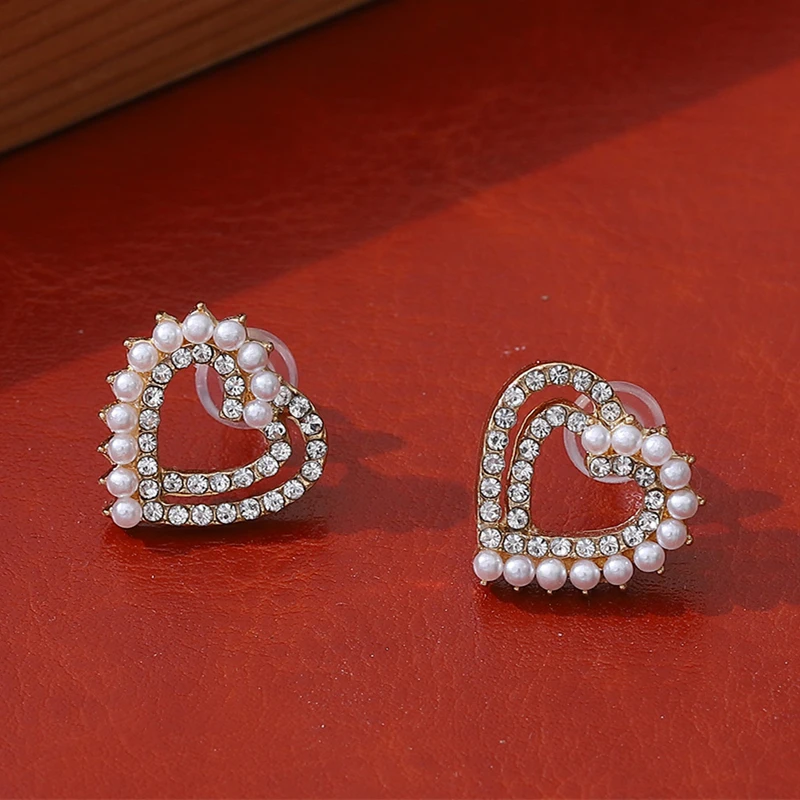 Elegant Love Heart Stud Earrings for Women Fashion Ear Stud Charming Rhinestone Imitation Pearl Stud Earring Trendy Jewelry Gift
Elegant Love Heart Stud Earrings for Women Fashion Ear Stud Charming Rhinestone Imitation Pearl Stud Earring Trendy Jewelry Gift