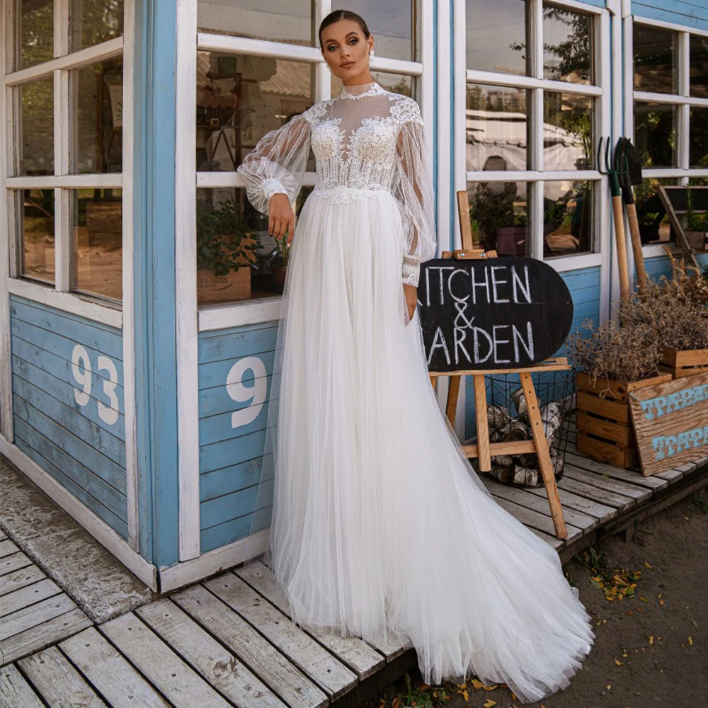 Boho Wedding Dress High Collar Long Sleeves Applique Beach Bridal Dresses A Line Buttons Illusion Summer Lace Wedding Gown 2022
Boho Wedding Dress High Collar Long Sleeves Applique Beach Bridal Dresses A Line Buttons Illusion Summer Lace Wedding Gown 2022